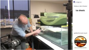 Professor John Wheeler demonstrates what happens to the earth when an ice sheet melts